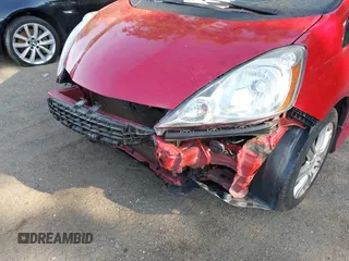 2011 Honda Fit Sport with VIN JHMGE8H55BS006252, listed as a IAAI auction lot 42132958 with 147,734 mi miles and . Bid and sale history available at DreamBid. Image 6.