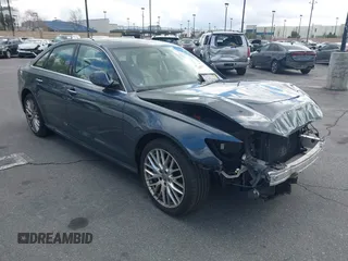 2016 Audi A6 2.0T Premium Plus with VIN WAUGFAFC8GN008717, listed as a IAAI auction lot 41686011 with 120,973 mi miles. Bid and sale history available at carsss.com. Image 1.