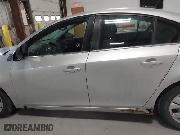 2015 Chevrolet Cruze LT with VIN 1G1PC5SB0F7106006, listed as a IAAI auction lot 41779345 with 127,532 mi miles and . Bid and sale history available at DreamBid. Image 14.