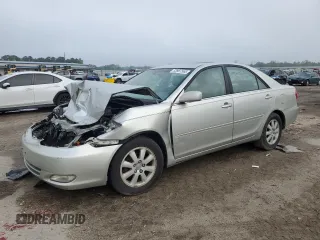 2004 Toyota Camry LE with VIN 4T1BE30K34U290211, listed as a Copart auction lot 53987565 with 276,248 mi miles and Salvage title. Bid and sale history available at DreamBid. Image 1.