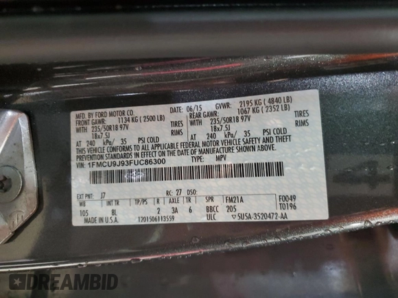 2015 Ford Escape Titanium with VIN 1FMCU9J93FUC86300, listed as a Copart auction lot 60852895 with 156,296 mi miles and Salvage title. Bid and sale history available at DreamBid. Image 13.