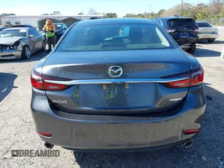 2020 Mazda 6 Sport with VIN JM1GL1UM7L1527203, listed as a IAAI auction lot 41378087 with 57,174 mi miles and . Bid and sale history available at DreamBid. Image 16.