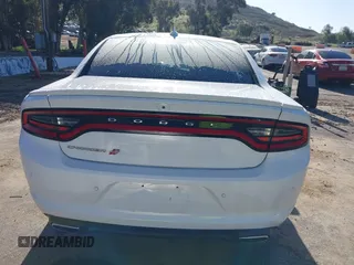 2019 Dodge Charger SXT with VIN 2C3CDXJGXKH533322, listed as a IAAI auction lot 41808838 with 95,877 mi miles and . Bid and sale history available at DreamBid. Image 17.