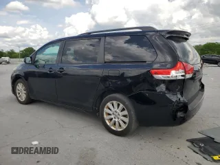 2014 Toyota Sienna LE with VIN 5TDJK3DC9ES087180, listed as a Copart auction lot 54420785 with 107,993 mi miles and Salvage title. Bid and sale history available at DreamBid. Image 2.