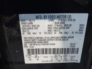 2014 Ford F-150 XL with VIN 1FTFX1CT7EFD11303, listed as a IAAI auction lot 41414356 with 183,586 mi miles. Bid and sale history available at carsss.com. Image 9.