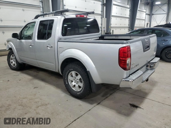 2006 Nissan Frontier SE with VIN 1N6AD07W86C406244, listed as a Copart auction lot 50157725 with 137,386 mi miles and Salvage title. Bid and sale history available at DreamBid. Image 2.