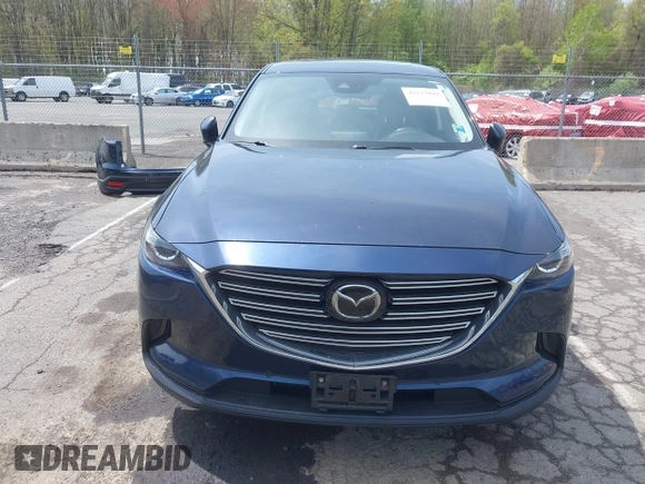 2019 Mazda CX-9 Touring z VIN JM3TCBCY6K0331905, wystawiony jako IAAI lot #42157842 z przebiegiem 84 211 mil mil oraz . Historia ofert i sprzedaży dostępna na DreamBid. Obrazek 13.