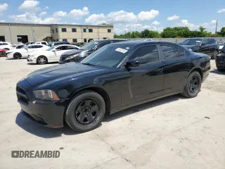 2013 Dodge Charger Police with VIN 2C3CDXAT1DH669564, listed as a Copart auction lot 56682395 with 157,650 mi miles and Clean Title. Bid and sale history available at DreamBid. Image 1.