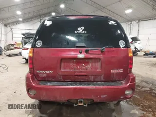 2006 GMC Envoy SLT with VIN 1GKDS13S362135683, listed as a IAAI auction lot 41477501 with 214,760 mi miles. Bid and sale history available at carsss.com. Image 16.