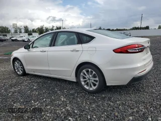 2020 Ford Fusion Hybrid SEL with VIN 3FA6P0MU8LR189560, listed as a Copart auction lot 76598364 with 57,443 mi miles and Salvage Title. Bid and sale history available at carsss.com. Image 2.