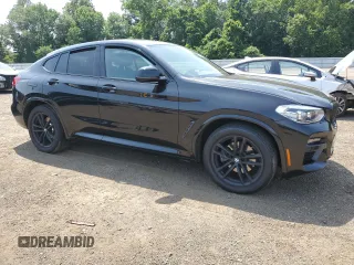2021 BMW X4 xDrive30i with VIN 5UX2V1C09M9E03411, listed as a Copart auction lot 62078545 with 49,101 mi miles and Salvage title. Bid and sale history available at DreamBid. Image 4.