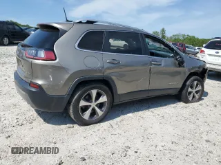 2020 Jeep Cherokee Limited with VIN 1C4PJMDX6LD617135, listed as a Copart auction lot 59088015 with 63,147 mi miles and Salvage title. Bid and sale history available at DreamBid. Image 3.