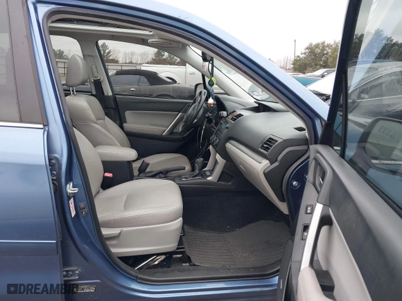 2015 Subaru Forester 2.5i Touring with VIN JF2SJAUC6FH440333, listed as a IAAI auction lot 41414701 with 115,223 mi miles. Bid and sale history available at carsss.com. Image 5.