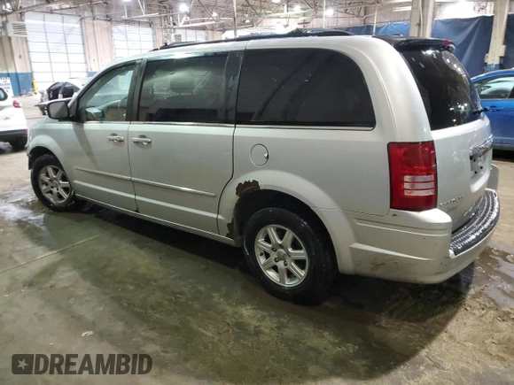 2010 Chrysler Town & Country Touring z VIN 2A4RR5D13AR351984, wystawiony jako Copart lot #82829684 z przebiegiem 258 151 mil mil oraz Czysty tytuł • Clean title. Historia ofert i sprzedaży dostępna na DreamBid. Obrazek 2.