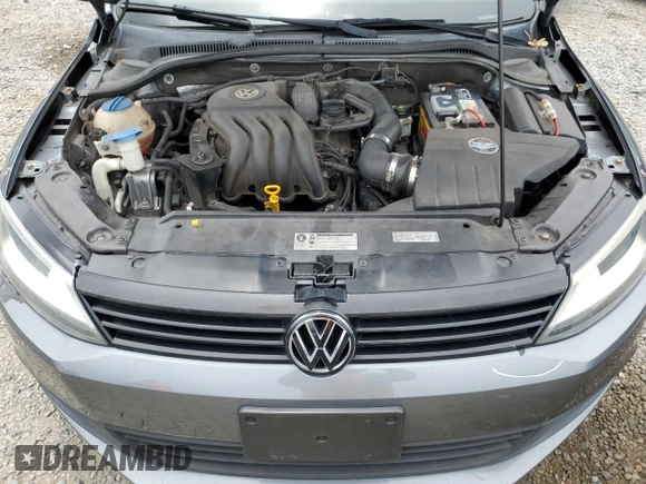 2014 Volkswagen Jetta S with VIN 3VW2K7AJ8EM231099, listed as a Copart auction lot 65752605 with 143,010 mi miles and Salvage title. Bid and sale history available at DreamBid. Image 11.