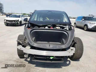 2023 Tesla Model Y Performance with VIN 7SAYGDEF9PF947667, listed as a Copart auction lot 52314795 with 40,634 mi miles and Salvage Title. Bid and sale history available at DreamBid. Image 5.