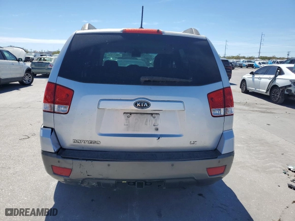 2009 Kia Borrego LX with VIN KNDJJ741595032228, listed as a Copart auction lot 49627355 with 233,654 mi miles and Salvage Title. Bid and sale history available at carsss.com. Image 6.