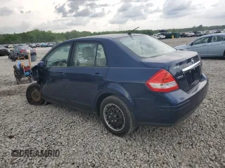 2009 Nissan Versa S with VIN 3N1BC11E19L433572, listed as a Copart auction lot 54084215 with 144,178 mi miles and Salvage title. Bid and sale history available at DreamBid. Image 2.