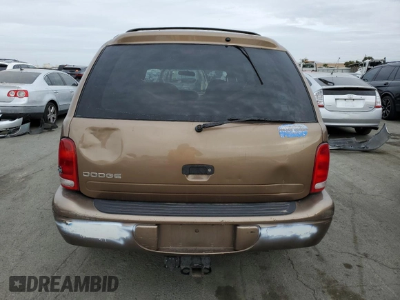 2000 Dodge Durango z VIN 1B4HR28Y4YF187411, wystawiony jako Copart lot #79060184 z przebiegiem 275 571 mil mil oraz Szkoda całkowita • Salvage title. Historia ofert i sprzedaży dostępna na DreamBid. Obrazek 6.