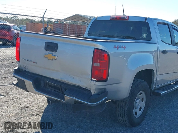 2020 Chevrolet Colorado 4WD Work Truck z VIN 1GCGTBENXL1205894, wystawiony jako IAAI lot #41058177 z przebiegiem 61 374 mil mil oraz . Historia ofert i sprzedaży dostępna na DreamBid. Obrazek 6.