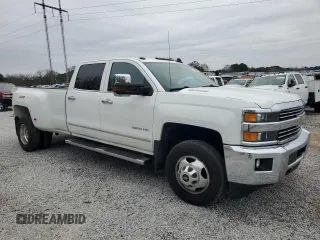 2015 Chevrolet Silverado 3500HD LTZ with VIN 1GC4K0C8XFF573426, listed as a Copart auction lot 85896784 with 104,104 mi miles and Salvage Title. Bid and sale history available at DreamBid. Image 4.