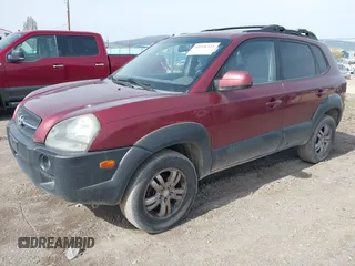 2007 Hyundai Tucson SE with VIN KM8JN72D27U615176, listed as a IAAI auction lot 41996325 with 130,396 mi miles and . Bid and sale history available at DreamBid. Image 2.
