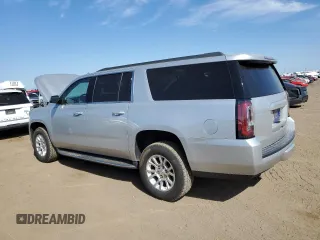 2016 GMC Yukon XL SLE with VIN 1GKS2FKC4GR285826, listed as a Copart auction lot 69486214 with 58,879 mi miles and Clean Title. Bid and sale history available at DreamBid. Image 2.