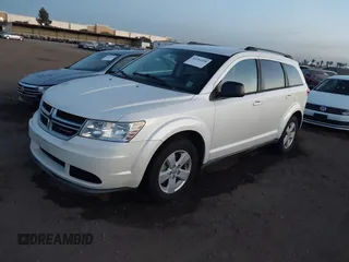 2013 Dodge Journey SE with VIN 3C4PDCAB2DT547459, listed as a IAAI auction lot 41254288 with 116,740 mi miles and . Bid and sale history available at DreamBid. Image 2.