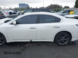 2014 Nissan Maxima S with VIN 1N4AA5AP6EC453903, listed as a IAAI auction lot 41194551 with 75,126 mi miles and . Bid and sale history available at DreamBid. Image 14.
