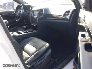 2014 Jeep Grand Cherokee Laredo with VIN 1C4RJEAGXEC130399, listed as a IAAI auction lot 41861664 with 106,925 mi miles. Bid and sale history available at carsss.com. Image 5.