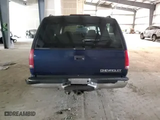 1999 Chevrolet Suburban with VIN 3GNEC16R5XG218523, listed as a Copart auction lot 72568494 with 297,020 mi miles and Salvage Title. Bid and sale history available at carsss.com. Image 6.