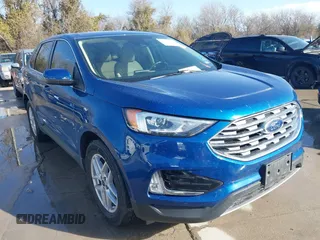 2021 Ford Edge SEL z VIN 2FMPK4J9XMBA54175, wystawiony jako IAAI lot #41705318 z przebiegiem 69 469 mil mil oraz . Historia ofert i sprzedaży dostępna na DreamBid. Obrazek 1.