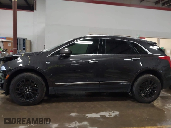 2018 Cadillac XT5 Luxury FWD with VIN 1GYKNCRS8JZ184322, listed as a IAAI auction lot 41225319 with 97,729 mi miles and . Bid and sale history available at carsss.com. Image 14.