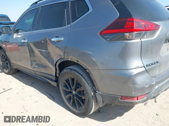 2018 Nissan Rogue SV with VIN 5N1AT2MT2JC749146, listed as a IAAI auction lot 41672824 with 121,377 mi miles and . Bid and sale history available at carsss.com. Image 6.