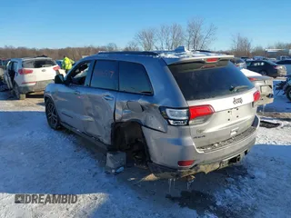 2017 Jeep Grand Cherokee Trailhawk with VIN 1C4RJFLT4HC657682, listed as a IAAI auction lot 41286507 with 123,646 mi miles and . Bid and sale history available at DreamBid. Image 3.