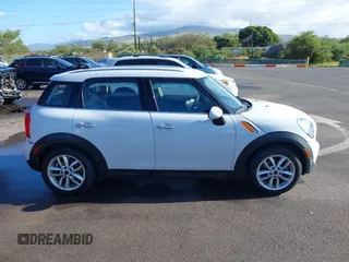 2013 MINI Countryman with VIN WMWZB3C52DWR35806, listed as a IAAI auction lot 42184010 with 93,380 mi miles and . Bid and sale history available at DreamBid. Image 13.