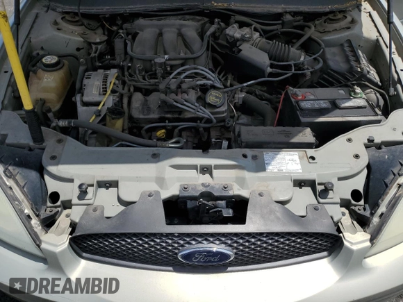 2007 Ford Taurus SE with VIN 1FAFP53U27A156844, listed as a Copart auction lot 59204695 with 157,633 mi miles and Salvage title. Bid and sale history available at DreamBid. Image 11.