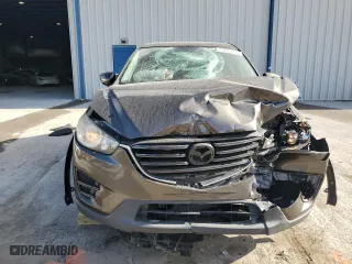 2016 Mazda CX-5 Sport with VIN JM3KE2BY5G0662568, listed as a Copart auction lot 51613115 with 0 mi miles and Non Repairable. Bid and sale history available at carsss.com. Image 5.