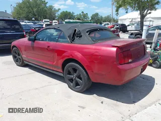 2008 Ford Mustang Deluxe with VIN 1ZVHT84N785153453, listed as a IAAI auction lot 41917393 with 124,104 mi miles and . Bid and sale history available at carsss.com. Image 3.