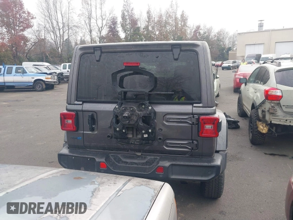 2021 Jeep Wrangler Unlimited Sahara z VIN 1C4JJXP68MW745098, wystawiony jako IAAI lot #41461092 z przebiegiem 36 410 mil mil oraz . Historia ofert i sprzedaży dostępna na DreamBid. Obrazek 17.