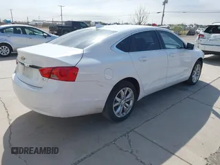 2017 Chevrolet Impala LT with VIN 2G1105S39H9164236, listed as a IAAI auction lot 42001427 with 150,937 mi miles and . Bid and sale history available at DreamBid. Image 4.