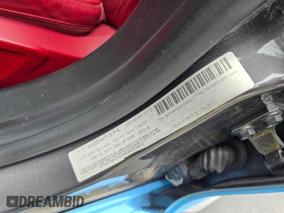 2014 Maserati Ghibli S Q4 z VIN ZAM57RTA7E1089301, wystawiony jako Copart lot #54070585 z przebiegiem 59 787 mil mil oraz Szkoda całkowita • Salvage title. Historia ofert i sprzedaży dostępna na DreamBid. Obrazek 10.