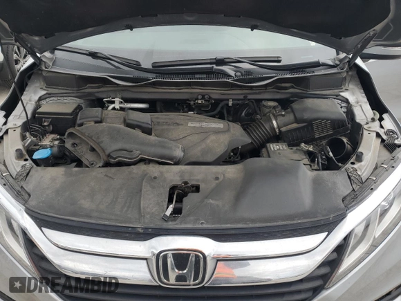 2019 Honda Odyssey EX-L z VIN 5FNRL6H73KB121127, wystawiony jako Copart lot #53118835 z przebiegiem 87 261 mil mil oraz Szkoda całkowita • Salvage title. Historia ofert i sprzedaży dostępna na DreamBid. Obrazek 12.