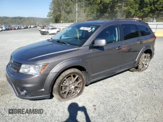 2013 Dodge Journey R/T with VIN 3C4PDCEG2DT705790, listed as a Copart auction lot 75567204 with 136,373 mi miles and Salvage title. Bid and sale history available at DreamBid. Image 1.