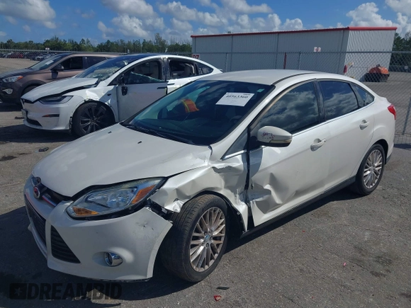 2012 Ford Focus SEL with VIN 1FAHP3H25CL282490, listed as a IAAI auction lot 40563360 with 223,864 mi miles. Bid and sale history available at carsss.com. Image 2.