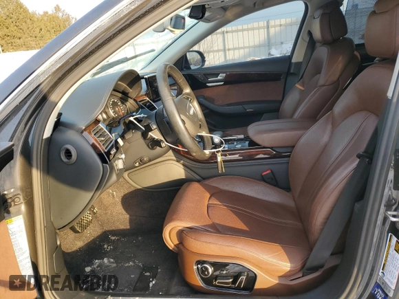 2016 Audi A8 with VIN WAUJRAFD5GN007742, listed as a Copart auction lot 44698375 with 110,830 mi miles and Salvage title. Bid and sale history available at DreamBid. Image 7.