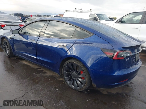 2022 Tesla Model 3 Performance with VIN 5YJ3E1EC7NF306192, listed as a IAAI auction lot 41453931 with 36,450 mi miles. Bid and sale history available at carsss.com. Image 3.