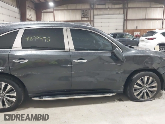 2016 Acura MDX w/Tech with VIN 5FRYD4H40GB017297, listed as a IAAI auction lot 41899975 with 95,757 mi miles. Bid and sale history available at carsss.com. Image 18.