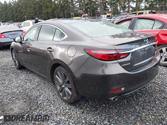 2018 Mazda 6 Grand Touring with VIN JM1GL1TYXJ1301545, listed as a IAAI auction lot 41131114 with 34,089 mi miles and . Bid and sale history available at DreamBid. Image 3.