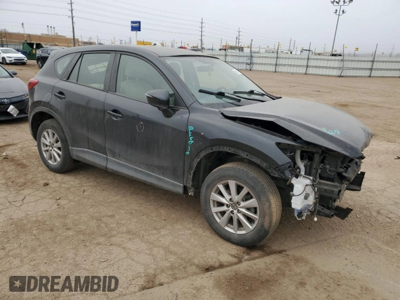2016 Mazda CX-5 Sport with VIN JM3KE4BYXG0898807, listed as a Copart auction lot 48887985 with 71,418 mi miles and Salvage Title. Bid and sale history available at carsss.com. Image 4.
